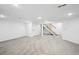 Spacious basement with recessed lighting, carpet, and stairs to the upper level at 290 Beryl Way, Broomfield, CO 80020