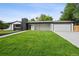 Charming single-story home featuring an attached garage, inviting front porch, and well-maintained lawn at 290 Beryl Way, Broomfield, CO 80020