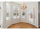 Bright breakfast nook with large windows, plantation shutters, and a chandelier at 2250 Indian Paintbrush Cir, Highlands Ranch, CO 80129