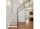 Welcoming entryway with hardwood floors and staircase at 2250 Indian Paintbrush Cir, Highlands Ranch, CO 80129