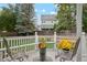 Cozy back patio with seating and a view of the lush, green yard at 2250 Indian Paintbrush Cir, Highlands Ranch, CO 80129