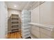 Well-organized walk-in closet with custom shelving and ample storage space at 2250 Indian Paintbrush Cir, Highlands Ranch, CO 80129