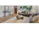 Bright living room with modern sofas, stylish decorations, and lots of natural light at 3384 W Arlington Ave, Littleton, CO 80123
