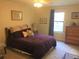 This bedroom is well decorated with a window at 7665 E Eastman Ave # 110C, Denver, CO 80231