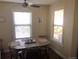 Cozy dining area with natural light and seating for four at 7665 E Eastman Ave # 110C, Denver, CO 80231