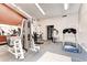 Well-equipped gym area with various machines and equipment for a complete workout experience at 7665 E Eastman Ave # 110C, Denver, CO 80231