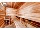 Inviting sauna with wood benches and walls for ultimate relaxation and therapeutic heat at 7665 E Eastman Ave # 110C, Denver, CO 80231