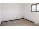 Simple bedroom with neutral color palette and new carpet at 3380 S Oak Ct, Denver, CO 80227