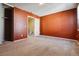 Bedroom with a large window and orange walls at 1811 S Quebec Way # 187, Denver, CO 80231