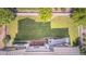 Aerial view of a home showcasing a spacious backyard, patio area, and surrounding landscape at 16383 Ute Peak Way, Broomfield, CO 80023