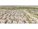 Aerial view of the neighborhood highlighting rooftops, streets, and community layout at 16383 Ute Peak Way, Broomfield, CO 80023