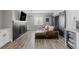 Basement media room boasts a fireplace, wet bar and sliding barn doors at 16383 Ute Peak Way, Broomfield, CO 80023