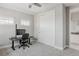 This bedroom features carpet, a ceiling fan, and a closet at 16383 Ute Peak Way, Broomfield, CO 80023