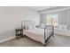 Bedroom with a bed, neutral paint, carpet, and a window seat at 16383 Ute Peak Way, Broomfield, CO 80023