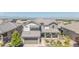 Two-story home with meticulous landscaping and a covered porch, offering great curb appeal and mountain views at 16383 Ute Peak Way, Broomfield, CO 80023
