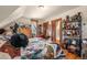 Charming bedroom with eclectic decor and hardwood floors at 3039 W 22Nd Ave, Denver, CO 80211