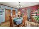 Bright dining room featuring hardwood floors and wood table at 3039 W 22Nd Ave, Denver, CO 80211