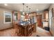 Spacious kitchen featuring an island, stainless steel appliances, and ample cabinetry at 3039 W 22Nd Ave, Denver, CO 80211