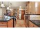 Kitchen boasting stainless steel appliances and granite countertops at 3039 W 22Nd Ave, Denver, CO 80211