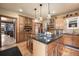 Open kitchen with an island, stainless steel appliances, and a view to the living room at 3039 W 22Nd Ave, Denver, CO 80211