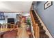 Spacious living room with hardwood floors and a view of the staircase at 3039 W 22Nd Ave, Denver, CO 80211