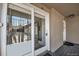 This exterior shot shows the balcony with sliding glass doors to the residence at 214 N Main St # 14, Breckenridge, CO 80424