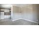 The living room provides an open view of the kitchen and features carpeted floors at 214 N Main St # 14, Breckenridge, CO 80424