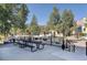 Outdoor space features a picnic table and BBQ, perfect for gatherings with nearby mountain views at 214 N Main St # 14, Breckenridge, CO 80424