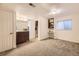 This finished basement area includes a bathroom vanity and storage shelves, perfect for a flexible living space at 2777 E Geddes Ave, Centennial, CO 80122