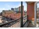 Balcony view showcasing surrounding city buildings and skyline at 1499 Blake St # 6A, Denver, CO 80202