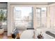 Balcony view showcases cityscape through open windows at 1499 Blake St # 6A, Denver, CO 80202