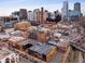 Panoramic aerial view showcases a vibrant city skyline with diverse architecture and bustling street life at 1499 Blake St # 6A, Denver, CO 80202