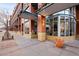 Exterior view of building featuring brick and stone with landscaped sidewalk at 1499 Blake St # 6A, Denver, CO 80202