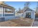 Inviting backyard featuring a patio seating area, gravel yard, storage shed, and easy access to the home at 722 Kimbark St, Longmont, CO 80501