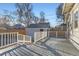 Spacious gray backyard deck perfect for outdoor entertaining with custom railings and a separate storage shed at 722 Kimbark St, Longmont, CO 80501