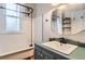 Charming bathroom with clawfoot tub, tiled shower, and vintage-inspired vanity at 722 Kimbark St, Longmont, CO 80501