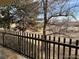 Enjoy the outside view from the balcony with a classic black railing for secure relaxation at 14300 E Marina Dr # 106, Aurora, CO 80014