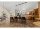 The kitchen features granite countertops, a center island, and modern stainless steel appliances at 8724 Armadillo Trl, Evergreen, CO 80439