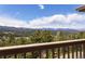 Enjoy breathtaking mountain views from the deck at 8724 Armadillo Trl, Evergreen, CO 80439
