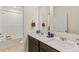 Modern bathroom with double vanity and a bathtub at 15740 Spruce St, Thornton, CO 80602