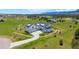 Luxury home showcasing a long driveway, spacious lot, and mountain views at 609 Pioneer Camp Vw, Palmer Lake, CO 80133