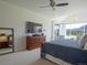 Relaxing main bedroom boasts mountain views, a ceiling fan, and a sitting area at 609 Pioneer Camp Vw, Palmer Lake, CO 80133