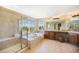 Luxurious bathroom with a soaking tub, walk-in shower, dual vanities, and ample natural light for a spa-like experience at 19096 W 53Rd Pl, Golden, CO 80403