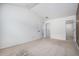 A simply designed bedroom space that is carpeted and features two closets and overhead lighting at 12710 Jasmine St # C, Thornton, CO 80602