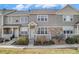 Charming townhome exterior featuring stone accents, neutral siding, and a welcoming entrance in a well-kept community at 12710 Jasmine St # C, Thornton, CO 80602
