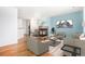 Inviting living room with hardwood floors, modern fireplace, and stylish contemporary decor at 12710 Jasmine St # C, Thornton, CO 80602
