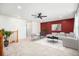 Stylish living room featuring modern decor, including a plush sofa and vibrant accent wall at 12710 Jasmine St # C, Thornton, CO 80602