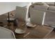 A close-up of a dining table showcasing place settings and minimalist decor at 4631 Zuni St, Denver, CO 80211