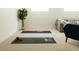 Flex room that features yoga mats, free weights, and space for exercise at 4631 Zuni St, Denver, CO 80211