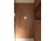 Modern shower with tiled wall, hexagon floors, and gold shower fixture and shower niche at 4631 Zuni St, Denver, CO 80211